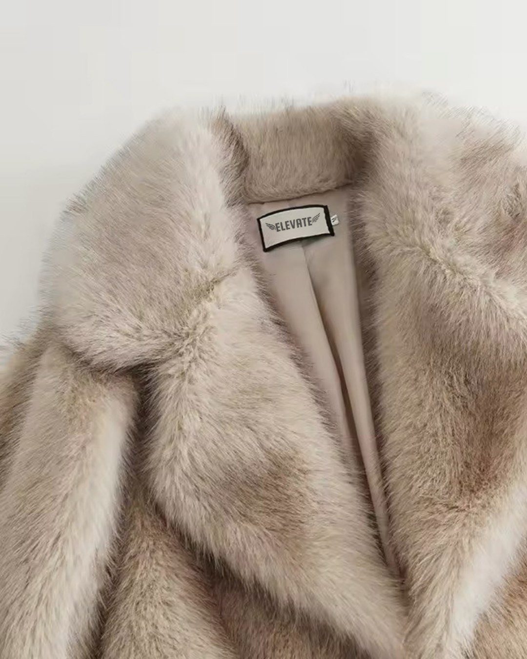 THE PLUSH FAUX FUR COAT