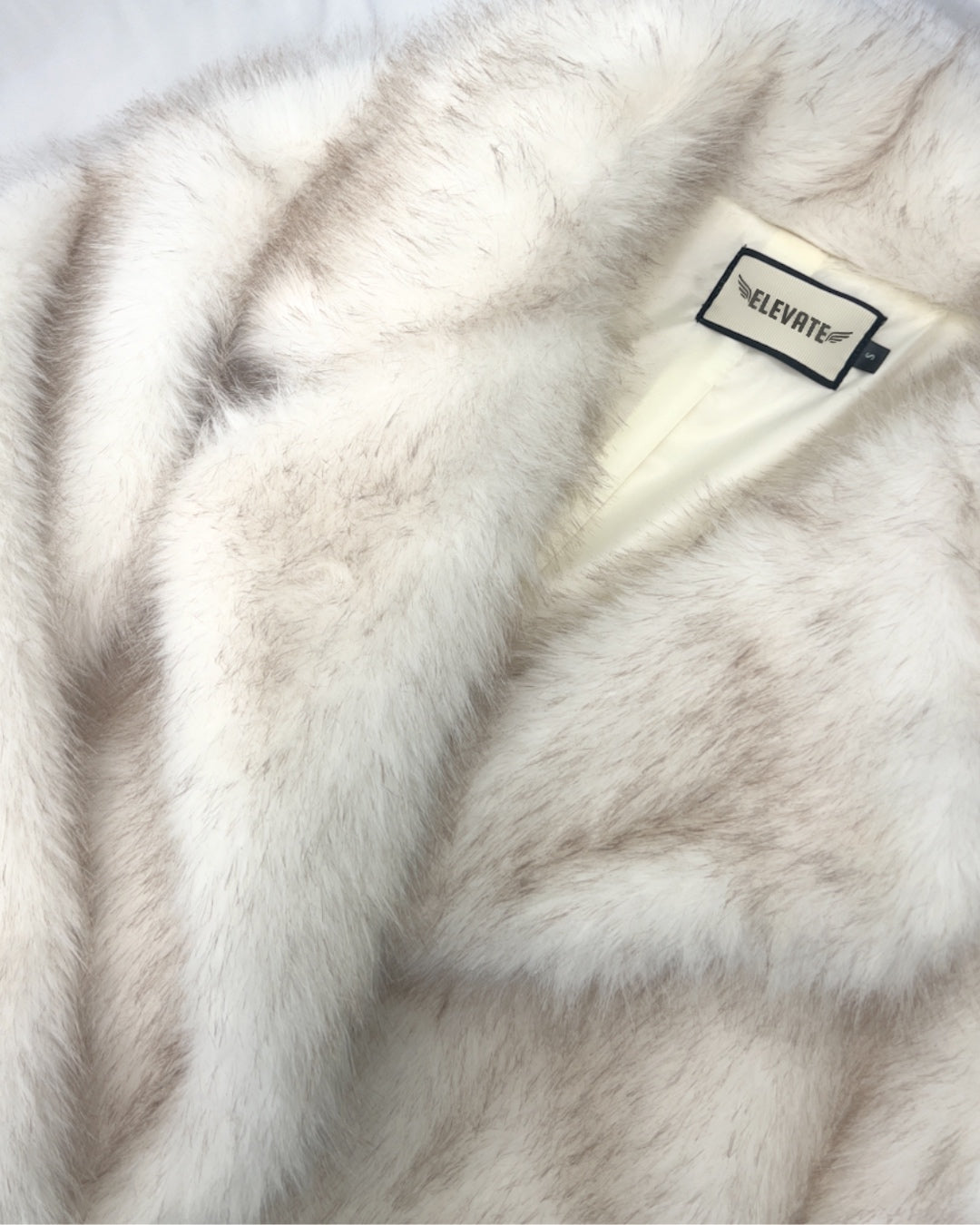 THE PLUSH FAUX FUR COAT