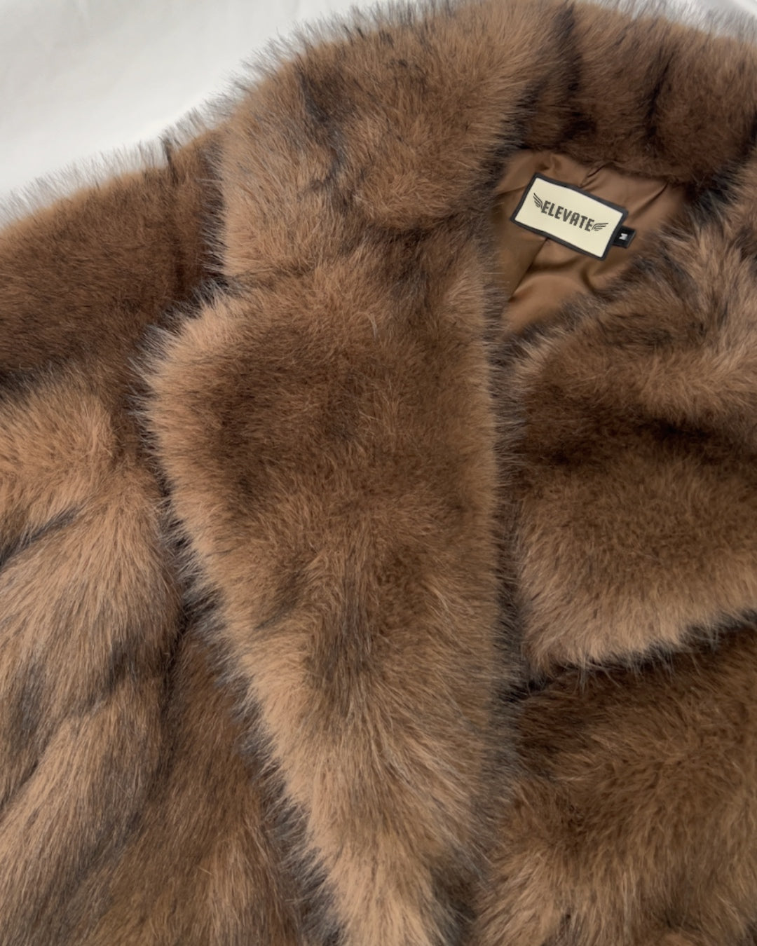 THE PLUSH FAUX FUR COAT